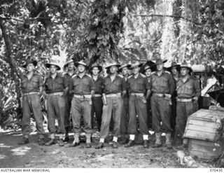 WEBER POINT, NEW GUINEA, 1944-02-14. OFFICERS OF HEADQUARTERS 8TH INFANTRY BRIGADE. IDENTIFIED PERSONNEL ARE: NX118443 LIEUTENANT W.E. LETTON, SIGNAL OFFICER (1); NX76311 CAPTAIN D.D. NATHAN, ..