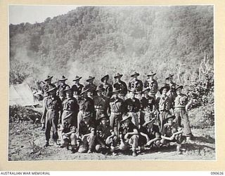 BUT, NEW GUINEA. 1945-04-10. BATTALION HEADQUARTERS 2/8 INFANTRY BATTALION PERSONNEL AT THEIR CAMP (FOR IDENTIFICATION OF 24 NAMED PERSONNEL REFER TO PROVISIONAL CAPTION OR NAME INDEX)