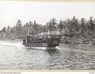 JACQUINOT BAY, NEW BRITAIN. 1944-11-28. 8-50 AN LCM (LANDING CRAFT MECHANISED) OF THE UNITED STATES ARMY ONE OF THE MANY BARGES OPERATING IN THE BAY