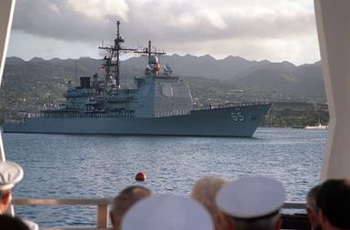 Crew members man the rails aboard the guided missile cruiser USS CHOSIN (CG-65) as the vessel approaches the USS ARIZONA MEMORIAL. The CHOSIN is taking part in an observance commemorating the 50th anniversary of the Japanese attack on Pearl Harbor