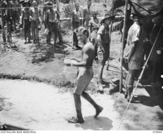 Oro Bay, New Guinea. 1943-04. Mess parade at the 10th Field Ambulance, Australian Army Medical Corps