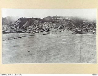 NEW GUINEA, 1943. THE DIVIDE OF THE MARKHAM AND RAMU RIVERS. IT WAS IMPOSSIBLE TO PIN- POINT THE DIVIDE ON THE GROUND. THE ONLY INDICATION WAS THAT THE RIVERS WERE FLOWING IN OPPOSITE DIRECTIONS - ..