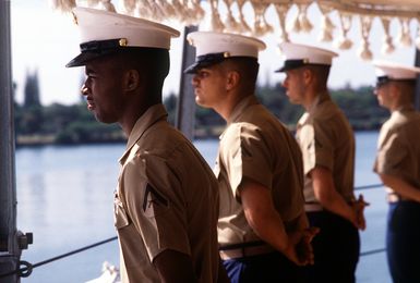 Members of the Marine Detachment participate in manning the rail as the battleship USS MISSOURI (BB-63) enters Pearl Harbor during the multinational exercise RIMPAC '90