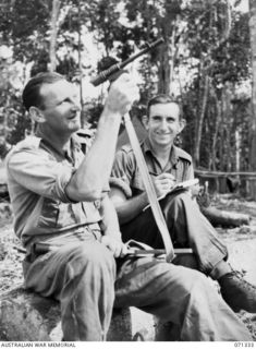 WAREO, NEW GUINEA, 1944-03-20. V25639 PRIVATE P.J. NOLAN (1), AND VX83108 LANCE-CORPORAL C.V. ROGERS (2), TWO FORMER BALLARAT MEN NOW SERVING WITH D COMPANY, 29/46TH INFANTRY BATTALION CLEANING ..