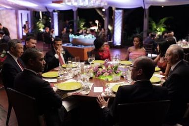 Barack Obama and Michelle Obama attend the Leaders Dinner at the APEC summit in Honolulu, Hawaii, November 12, 2011