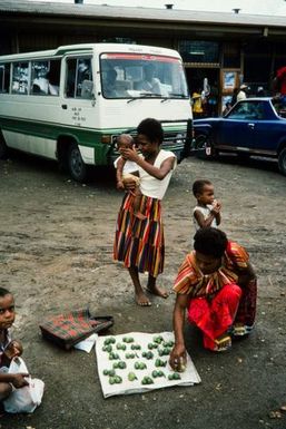 Papua New Guinea: Bus depot, people buying betel nuts