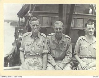 SIPAAI, BOUGAINVILLE ISLAND. 1945-01-08. OFFICERS OF THE 13TH SMALL SHIPS COMPANY VESSEL, "NEENA". IDENTIFIED PERSONNEL ARE:- VX115110 LIEUTENANT G.F. BAINBRIDGE (1); VX104361 LIEUTENANT N.G. ..