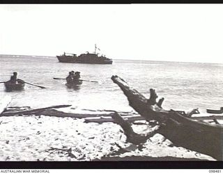 KOIL ISLAND, NEW GUINEA, 1945-10-31. A VISIT TO KOIL ISLAND WAS ARRANGED BY THE RED CROSS FOR THE PURPOSE OF MEDICAL INSPECTION OF THE NATIVE INHABITANTS. THE VISITING PARTY CONSISTED OF AN ..