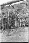 Men working on house frame