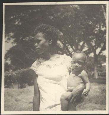 Woman holding a baby, New Guinea, ca. 1936 / Sarah Chinnery