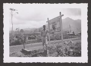 [Henry J. Cates Jr. Standing Beside Sign, #1]