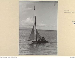 JACQUINOT BAY, NEW BRITAIN. 1945-06-10. A YACHT OF THE ROYAL PACIFIC YACHT CLUB, A CLUB FORMED BY MEN AND OFFICERS IN HEADQUARTERS 5 DIVISION AREA, WHO HAVE BUILT THEIR OWN CRAFT FROM ODDS AND ..