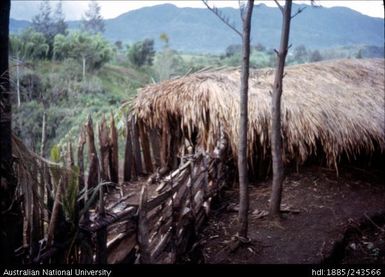 Hut with fenced in area