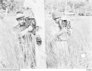 PORT MORESBY, PAPUA, 1944-02-25. VX123484 SERGEANT N.B. STUCKEY, PHOTOGRAPHER, MILITARY HISTORY SECTION (1) PICTURED WITH AN AMERICAN CAMERAMAN (2)