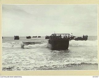 BOGADJIM, NEW GUINEA. 1944-04-26. LANDING CRAFT COMING INTO THE BEACH. THE CRAFT WILL BE USED TO ASSIST THE ADVANCE OF THE 57/60TH INFANTRY BATTALION TO MADANG