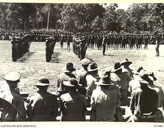 LAE, NEW GUINEA. 1944-04-02. MEMBERS OF THE 47TH INFANTRY BATTALION ON PARADE DURING THE PRESENTATION OF MEDALS TO MEMBERS OF THE ROYAL PAPUAN CONSTABULARY BY MAJOR GENERAL B.M. MORRIS, DSO, ..