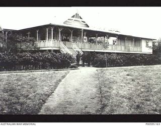 RABAUL, NEW GUINEA, C.1914. GERMAN GOVERNMENT HOUSE AFTER TAKEOVER BY THE AUSTRALIAN NAVY AND MILITARY EXPEDITIONARY FORCE (AN&MEF), WITH AUSTRALIAN GUARDS OUTSIDE. (ORIGINAL ALBUM HELD IN AWM ..