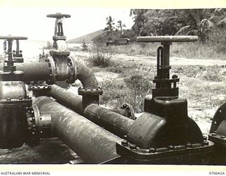 PORT MORESBY, PAPUA, 1944-02-26. MANIFOLD VALVES OF THE DIESEL OIL AND DISTILLATE OIL JUNCTIONS AT THE BULK OIL INSTALLATIONS OF THE 1ST PETROLEUM STORAGE COMPANY