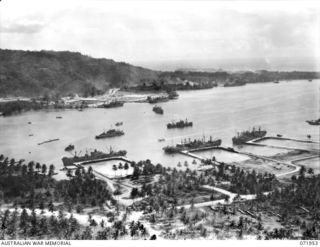 LANGEMAK BAY, NEW GUINEA. 1944-04-03. AN AERIAL PHOTOGRAPH INDICATING THE PORT DEVELOPMENT AND THE INCREASED MOVEMENT OF SUPPLIES THROUGH THE AREA
