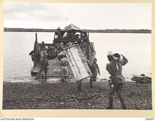 KAIRIRU ISLAND, NEW GUINEA. 1945-09-17. FOLLOWING THE SURRENDER JAPANESE NAVAL PERSONNEL WERE TRANSFERRED FROM KAIRIRU TO MUSCHU ISLAND. APART FROM THEIR PERSONAL GEAR MUCH FURNITURE WAS ..