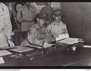 TOROKINA, BOUGAINVILLE. 1945-09-08. LIEUTENANT-GENERAL (LT-GEN) S. G. SAVIGE, GENERAL OFFICER COMMANDING 2 CORPS, ACCEPTED THE SURRENDER OF ALL JAPANESE FORCES ON BOUGAINVILLE FROM LT-GEN M. KANDA, ..