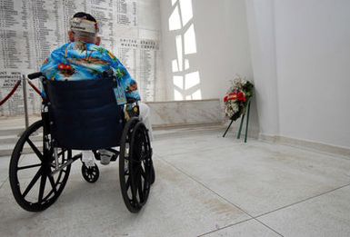 Clarendon Hetrick, Pearl Harbor survivor, sits in his wheelchair as he views the memorial shrine at the USS ARIZONA Memorial immediately following the joint Navy/National Park Service ceremony commemorating the 65th Anniversary of the attack on Pearl Harbor on Dec. 7, 2006, at Pearl Harbor, Hawaii. More than 1,500 Pearl Harbor survivors, their families and their friends from around the nation joined the more than 2,000 distiguished guests and the general public for the annual observance. (U.S. Navy photo by Mass Communication SPECIALIST 1ST Class James E. Foehl) (Released)