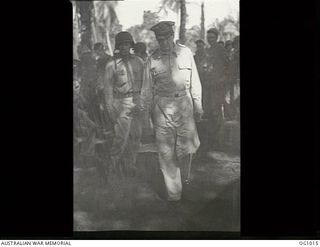 AITAPE, NORTH EAST NEW GUINEA. 1944-05-02. GENERAL DOUGLAS MACARTHUR AND HIS AIDE, COLONEL LLOYD, RETURNING ALONG A JUNGLE PATH AFTER HAVING WATCHED RAAF ENGINEERS AT WORK ON TADJI AIRSTRIP