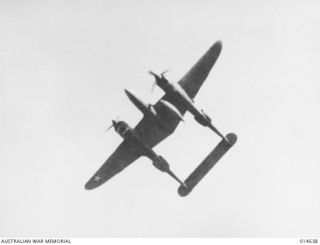 A United States Army Air Force (USAAF) P38, Lockheed Lightning in flight over the jungle of New Guinea during the Second World War