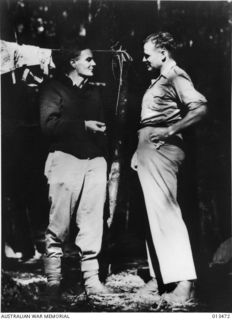 1942-10-19. OSMAR WHITE, MELBOURNE HERALD WAR CORRESPONDENT, AND CHESTER WILMOT OF THE AUSTRALIAN BROADCASTING COMMISSION, AT THEIR CAMP ON THE KOKODA FRONT. (NEGATIVE BY PARER)