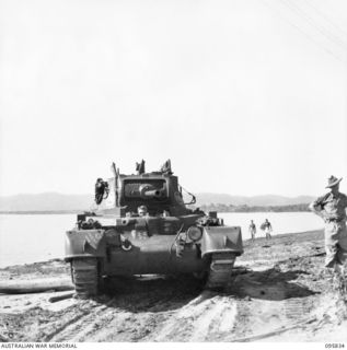 CAPE WOM, WEWAK AREA, NEW GUINEA. 1945-08-30. CORPORAL S. MORTENSEN IN A MATILDA TANK AT 2/4 ARMOURED REGIMENT WORKSHOP, CORPS OF AUSTRALIAN ELECTRICAL AND MECHANICAL ENGINEERS