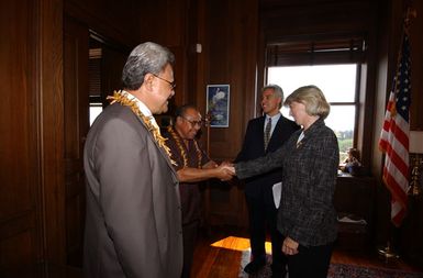 Secretary Gale Norton, far right, and Deputy Assistant Secretary for Insular Affairs David Cohen, second from right, greeting members of visiting political delegation from American Samoa, at Department of Interior headquarters