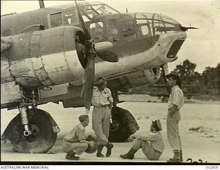 NEW GUINEA. C. 1944. CREW OF AN AUSTRALIAN BUILT BEAUFORT BOMBER AIRCRAFT USED EXTENSIVELY IN RESCUE AND COMMUNICATION WORK. LEFT TO RIGHT: 428183 SERGEANT (SGT) O. E. CARRICK, HOBART, TAS; 437690 ..