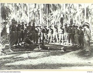 SIAR, NEW GUINEA. 1944-06-19. PERSONNEL OF NO.10 PLATOON B COMPANY, 58/59TH INFANTRY BATTALION, ATTENDING A LECTURE ON THE USES AND MAINTENANCE OF THE BREN LIGHT MACHINE GUN. IDENTIFIED PERSONNEL ..