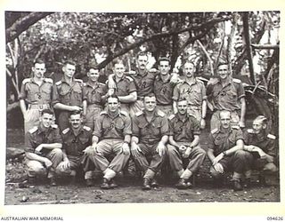 Lamarien, Henry Reid Bay, New Britain. A group of officers of 2/2 Commando Squadron. Identified, left to right, back row: NX130343 Lieutenant (Lt) R C P Field; NX5731 Lt F P Hearle; WX32871 Captain ..