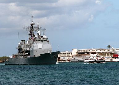 US Navy (USN) Sailors aboard e USN Ticonderoga Class Guided Missile Cruiser USS LAKE CHAMPLAIN (CG 57) "man e rails" as e ship pulls into Pearl Harbor, Hawaii. LAKE CHAMPLAIN is in Pearl Harbor to take part in e Rim of e World (RIMPAC) 2004. RIMPAC is e largest international maritime exercise in e waters around e Hawaiian Islands. This years exercise includes seven participating nations; Australia, Canada, Chile, Japan, Sou Korea, e United Kingdom and e United States. RIMPAC is e largest international maritime exercise in e waters around e Hawaiian Islands. This years exercise includes seven participating nations: Australia, Canada, Chile, Japan, Sou Korea...