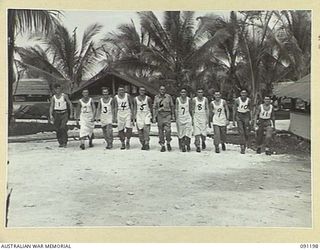 JACQUINOT BAY, NEW BRITAIN. 1945-04-26. PERSONNEL WHO ATTENDED A SCHOOL OF COOKING CONDUCTED BY WARRANT OFFICER II GIBBES AT 4 FIELD AMBULANCE. (FOR IDENTIFICATION OF 11 NAMED PERSONNEL REFER TO ..