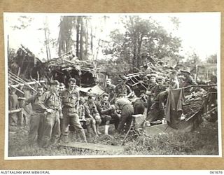 WAREO, NEW GUINEA. 1943-12. TROOPS OF THE 2/23RD AUSTRALIAN INFANTRY BATTALION, ATTENDING SICK PARADE AT THE NEWLY ESTABLISHED REGIMENTAL AID POST. IDENTIFIED PERSONNEL ARE: VX56908 PRIVATE A. A. ..