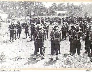 MADANG, NEW GUINEA. 1944-08-15. VX27 MAJOR-GENERAL A.H. RAMSAY, CBE, DSO, ED, GENERAL OFFICER COMMANDING 5TH DIVISION, ADDRESSING A PARADE OF MEMBERS OF THE 22ND INFANTRY BATTALION PRIOR TO THE ..