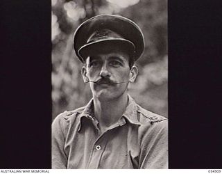 BULLDOG-WAU ROAD, NEW GUINEA, 1943-07-13. PORTRAIT OF MAJOR J. W. MAYNES OF HEADQUARTERS, ROYAL AUSTRALIAN ENGINEERS, 11TH AUSTRALIAN DIVISION, OFFICER IN CHARGE OF ALL BRIDGE BUILDING