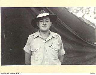 PORT MORESBY, NEW GUINEA. 1944-05-17. QX31918 PRIVATE D.C. DINGWALL (1), A BATMAN-DRIVER OF THE MILITARY HISTORY SECTION, ATTACHED TO HEADQUARTERS NEW GUINEA FORCE