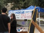 Students at a Phi Gamma Delta information table; photograph at University of California, Irvine