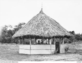 PORT MORESBY, NEW GUINEA. 1944-01-22. THE BARBERS SHOP CONSTRUCTED BY THE 2/101ST AUSTRALIAN GENERAL TRANSPORT COMPANY IN THEIR CAMP AREA