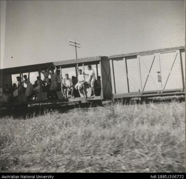 Workers riding the train