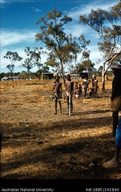 Indigenous males with instrument