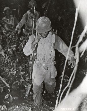 Men of the 93rd Infantry Division Knee-Deep in Mud
