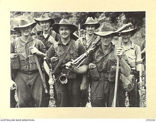 FARIA VALLEY, NEW GUINEA. 1944-02-10. MEMBERS OF THE 2/10TH INFANTRY BATTALION PICTURED ON THEIR JOURNEY TO RAMU VALLEY