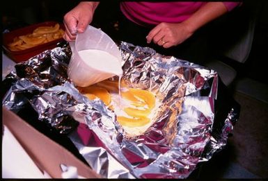 Food preparation for Niuean ear-piercing ceremony, Auckland