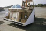 Federated States of Micronesia, baggage handler at airport on Yap Island