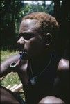 Portrait of young man with pipe