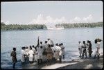 Europeans in a boat, Choiseul men on shore
